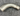 0850600--91 CESSNA 310 UNDERWING LEFT HAND FORWARD EXHAUST RISER.